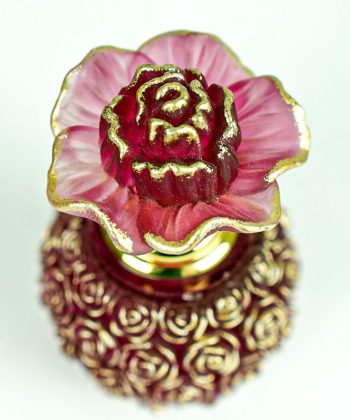 Red and gold floral perfume bottle