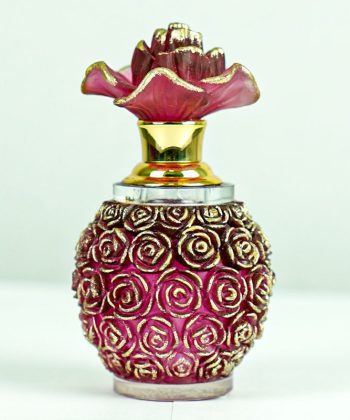 Red and gold floral perfume bottle